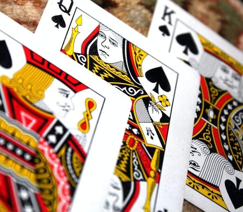 King, Jack, And Queen Of Spades Playing Cards